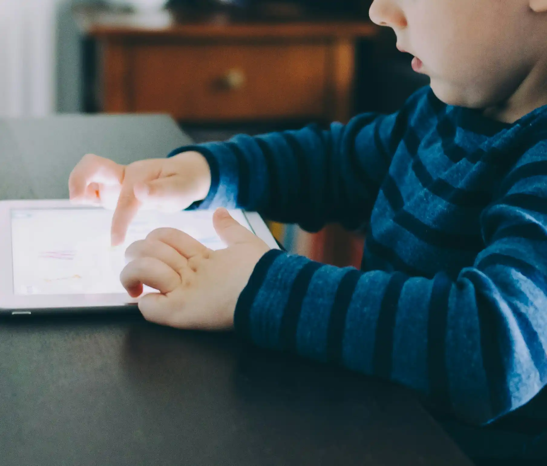 A child using a tablet